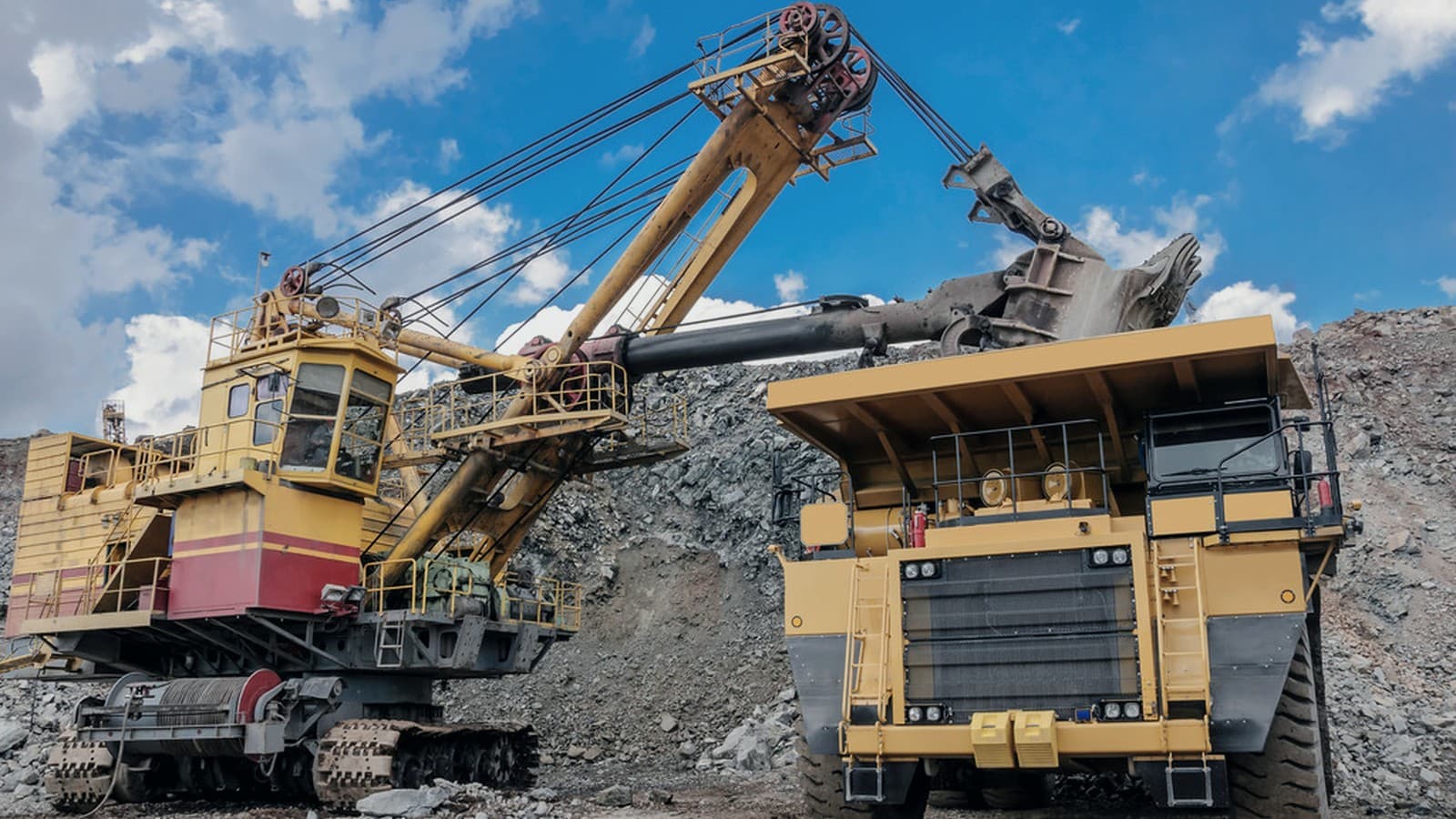 Mining and heavy construction equipment in an operating environment