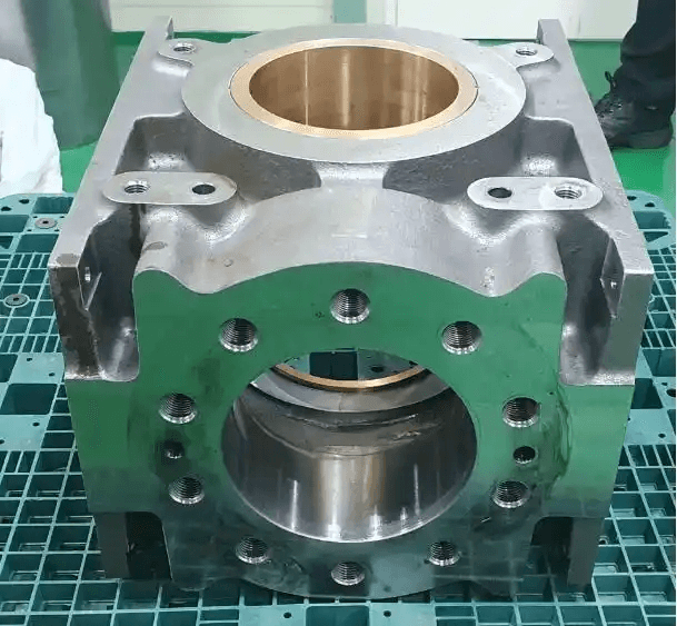Original worn pump housing, front view