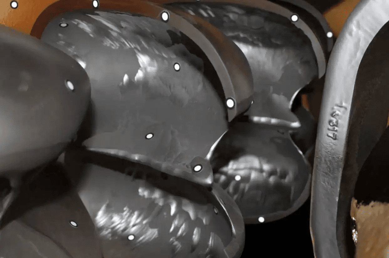 Kaplan turbine runner with cavitation-affected blade surfaces