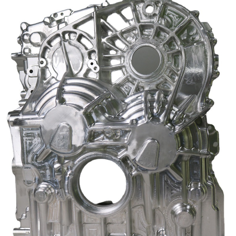 Complex CNC machined aluminum component showing ribbed geometry and precision bores